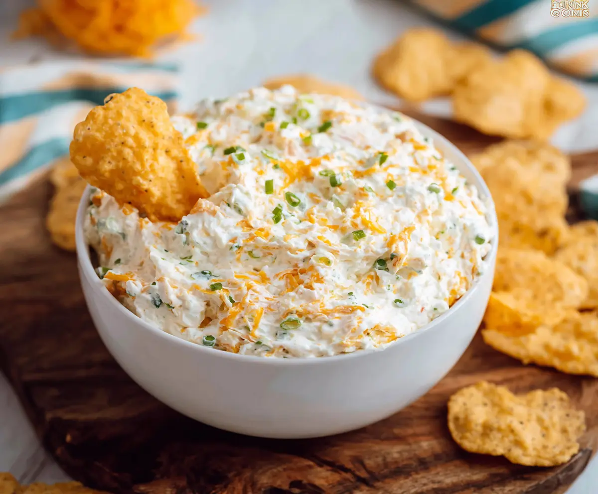 Creamy Cheddar Ranch Dip served with fresh vegetables and chips.