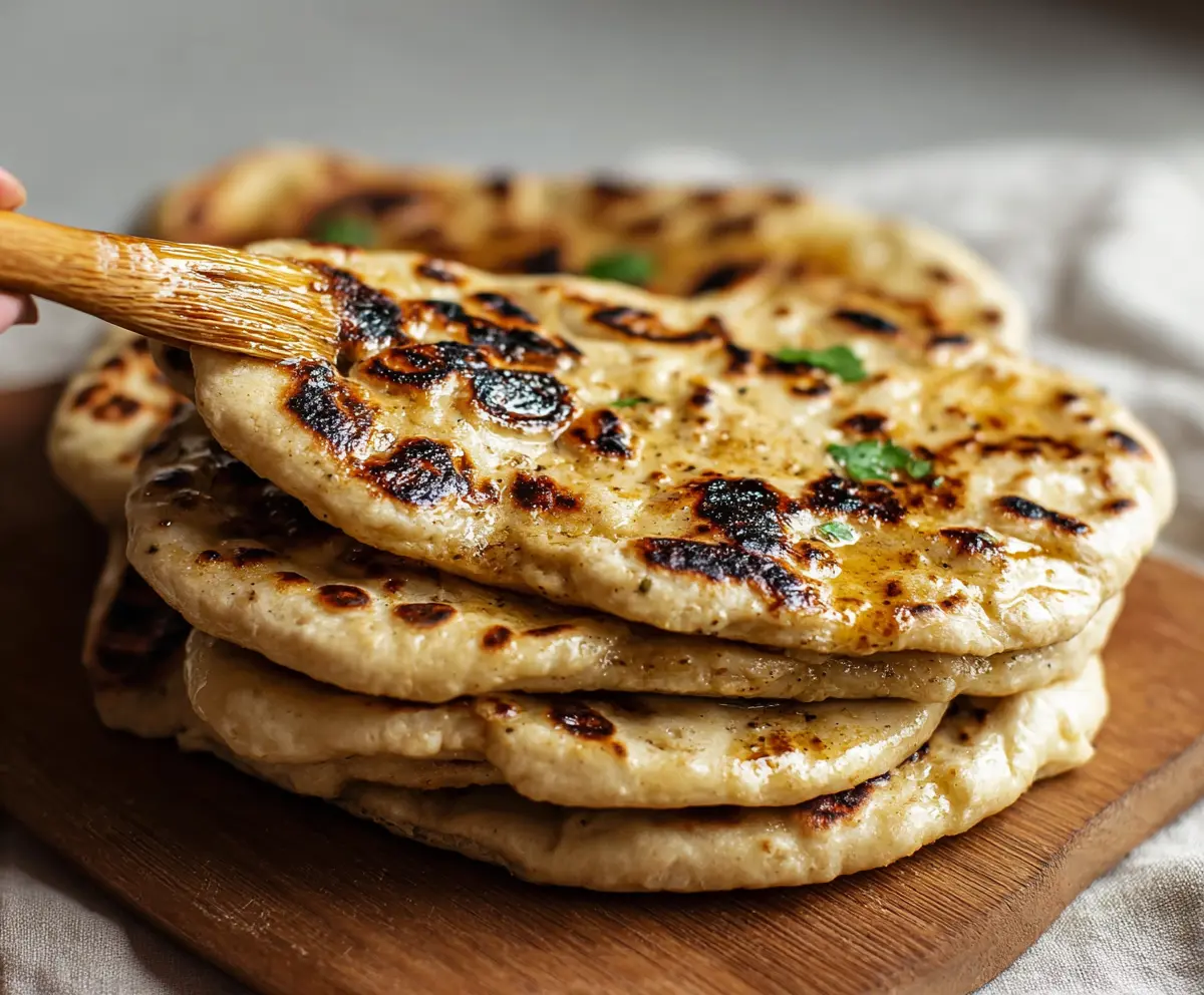 Delicious homemade sourdough discard naan bread fresh out of the oven.