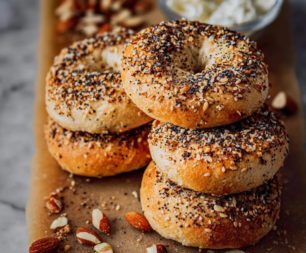 Homemade cottage cheese and almond flour bagels on a wooden board